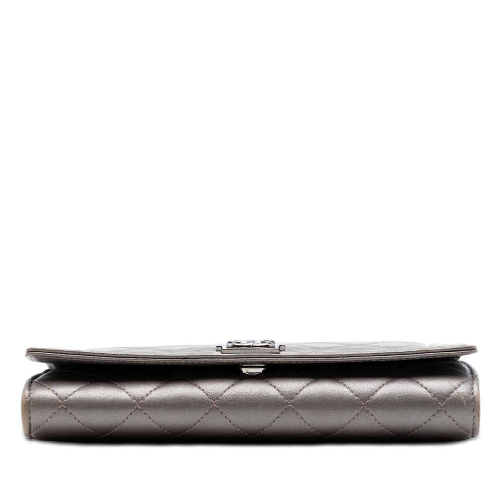 Chanel Quilted Metallic Lambskin Boy Clutch On Chain - Brown