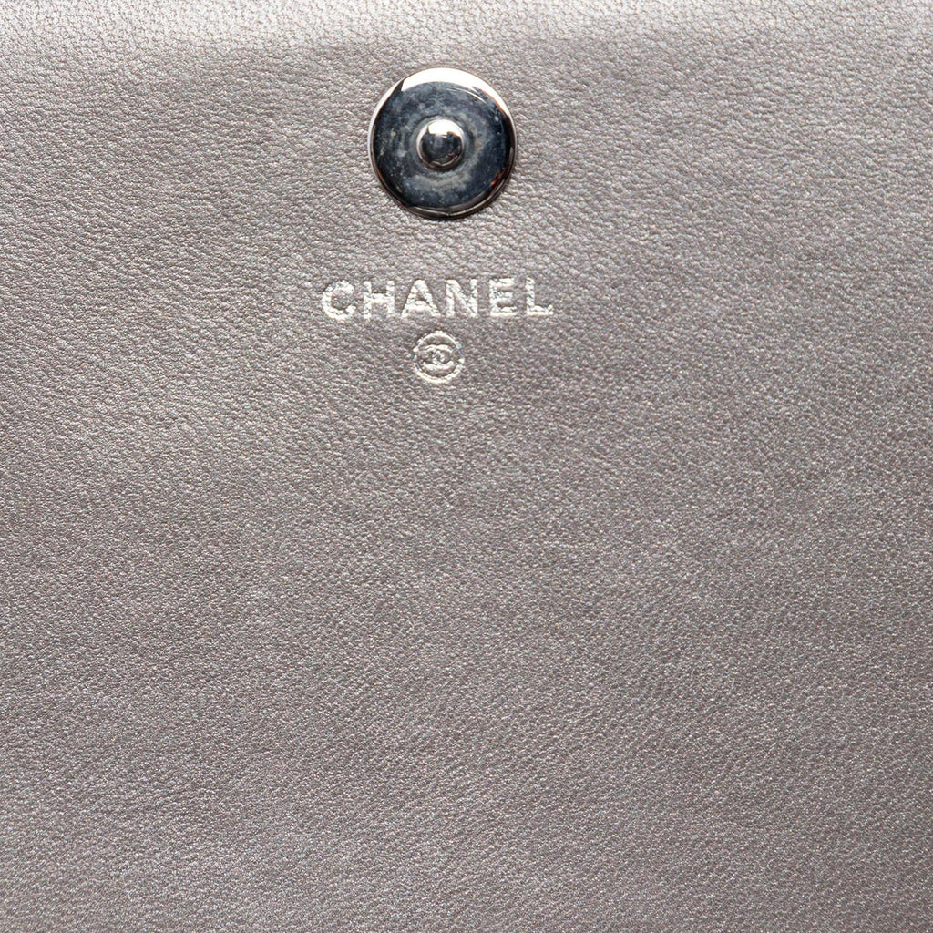 Chanel Quilted Metallic Lambskin Boy Clutch On Chain - Brown