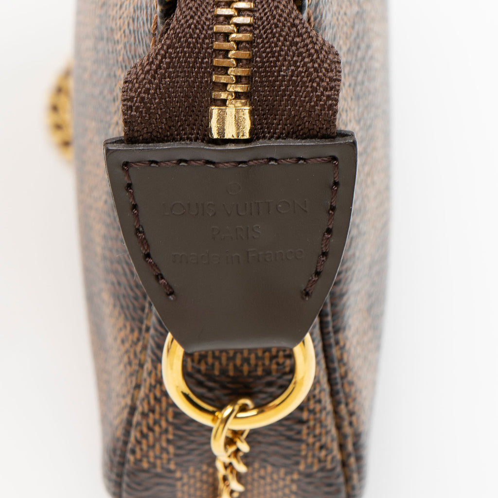 Louis Vuitton Damier Ebene Mini Pochette Accessoires - Brown