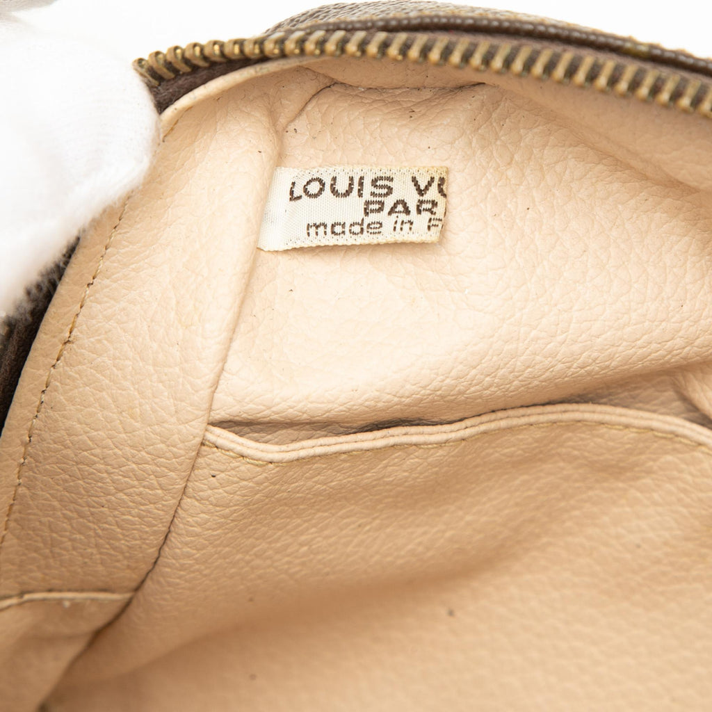 Louis Vuitton Monogram Trousse Toilette 23 Clutch - Brown