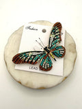 Butterfly Brooch In Topaz Mix